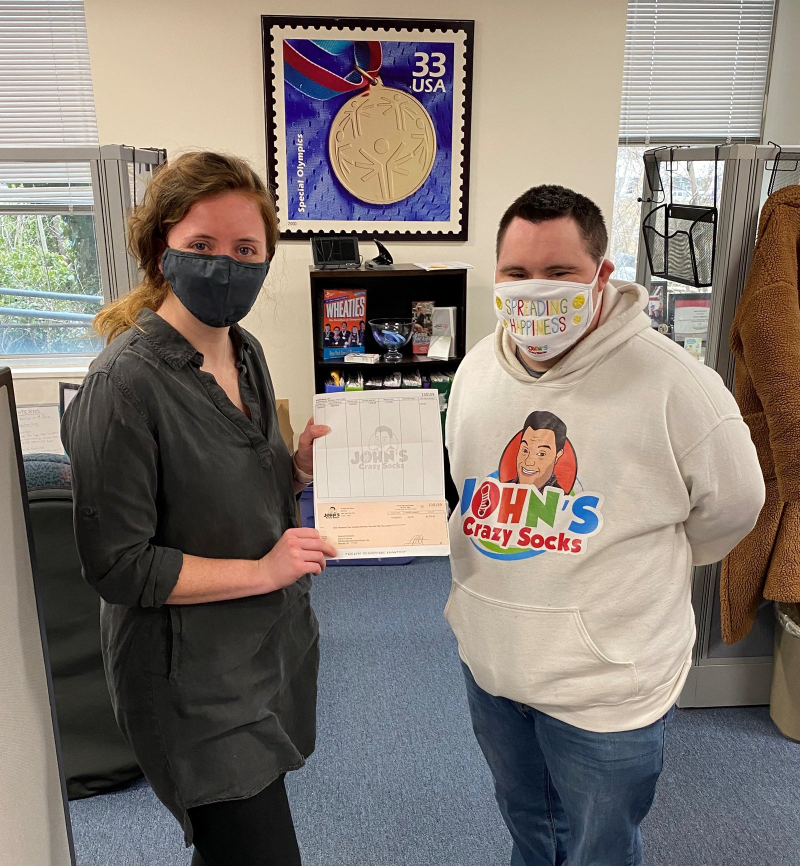 John’s Crazy Socks Delivers Donation to The Special Olympics