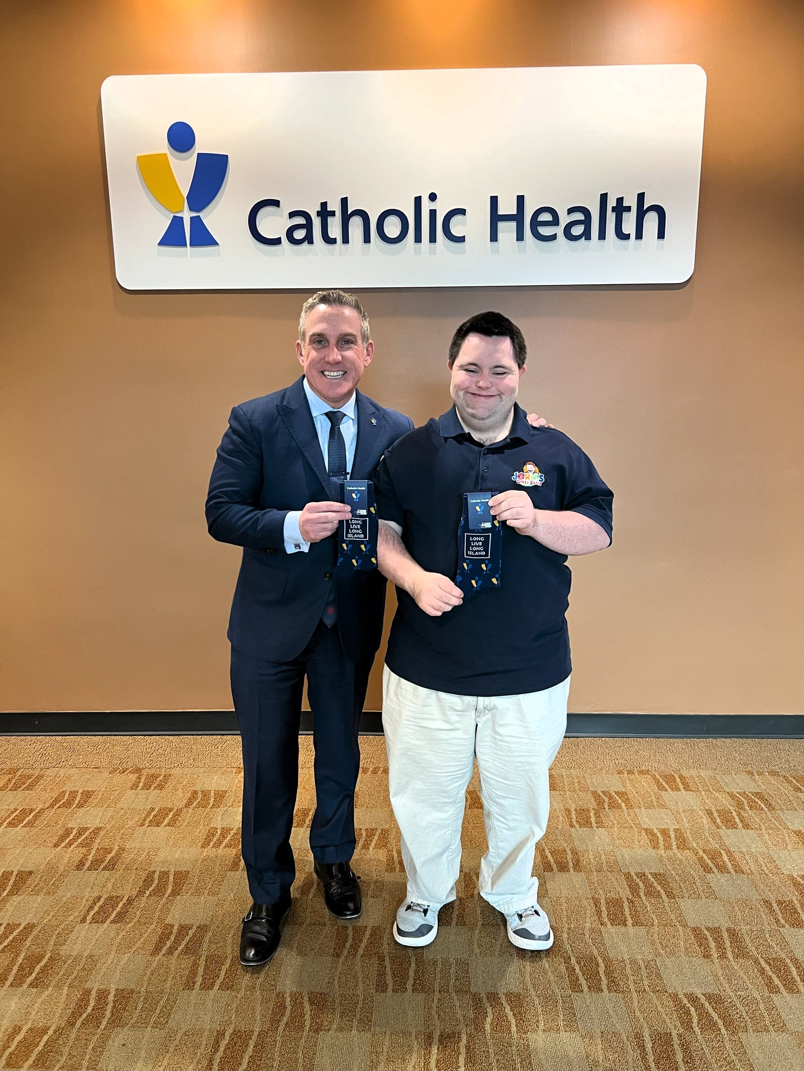 John from John’s Crazy Socks Delivers Custom Socks to Catholic Health