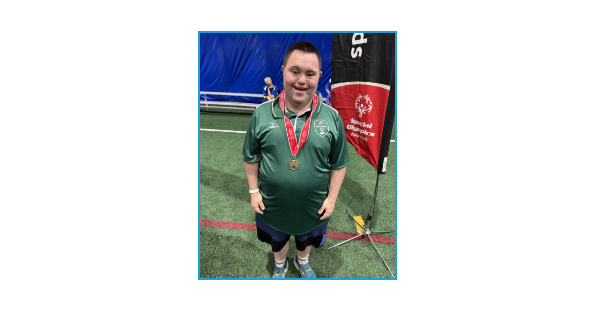 John Cronin celebrates a gold medal victory at the Special Olympics Fall Games.