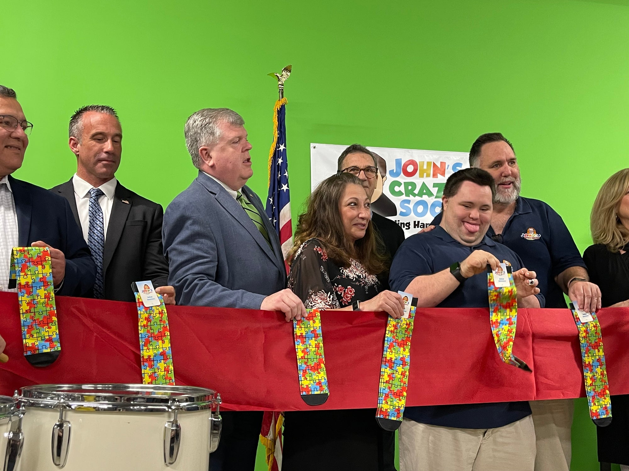 Johns Crazy Socks Hosts Ribbon Cutting and Grand Opening Ceremony for New Headquarters in Farmingdale New York
