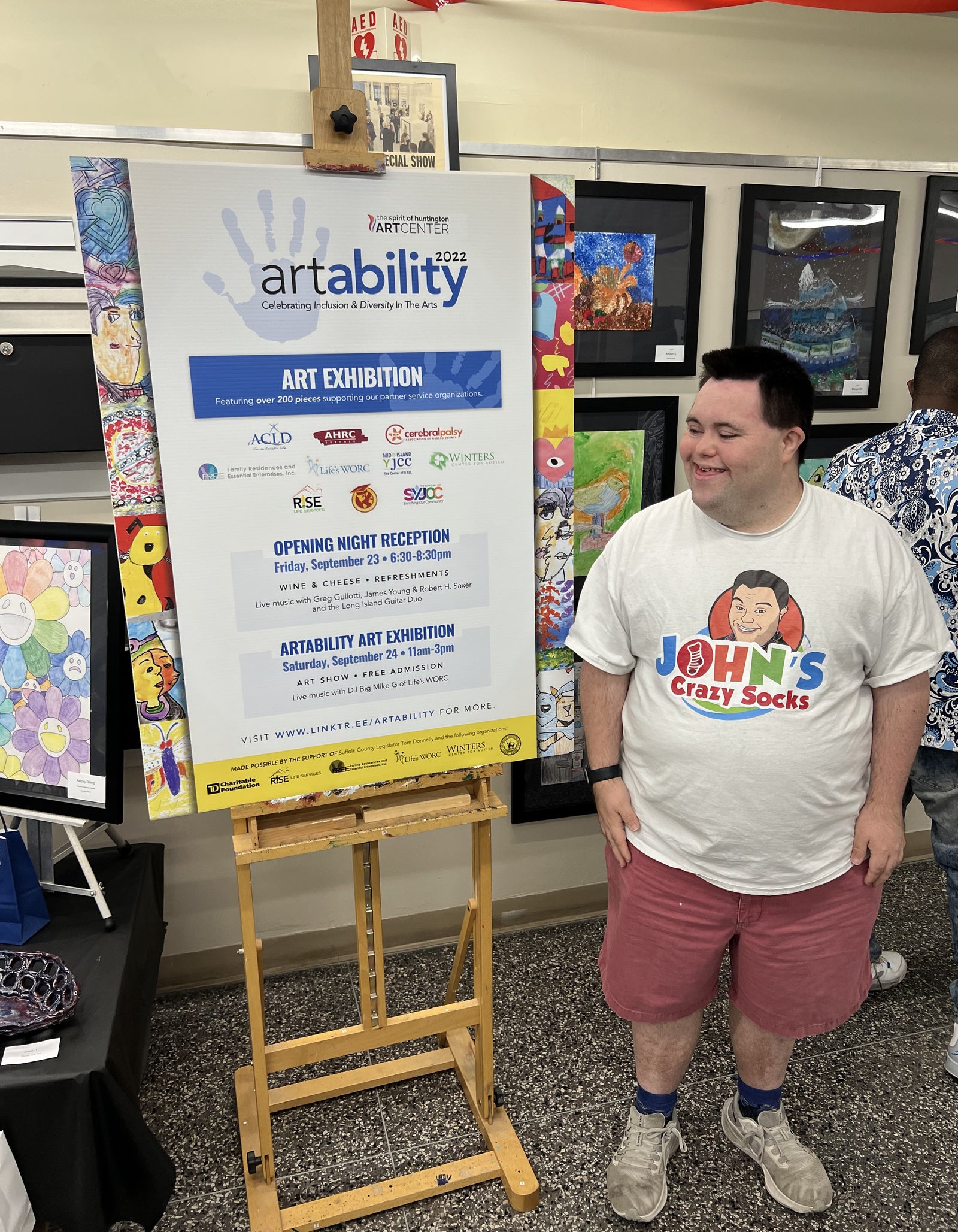 John of John’s Crazy Socks Visits the Art Ability Art Show at the Spirit of Huntington Art Center