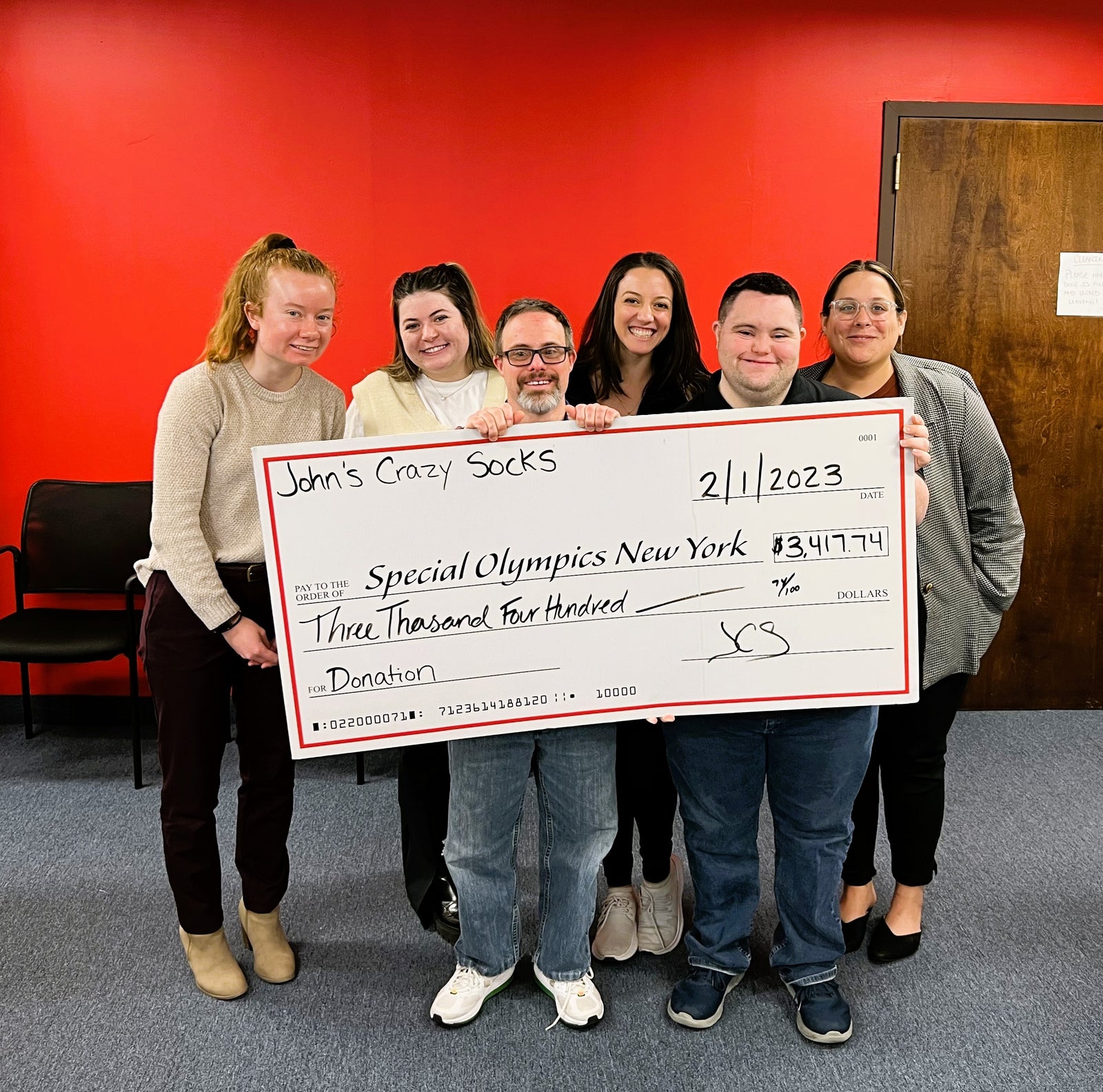 John’s Crazy Socks Delivers Another Donation to the Special Olympics