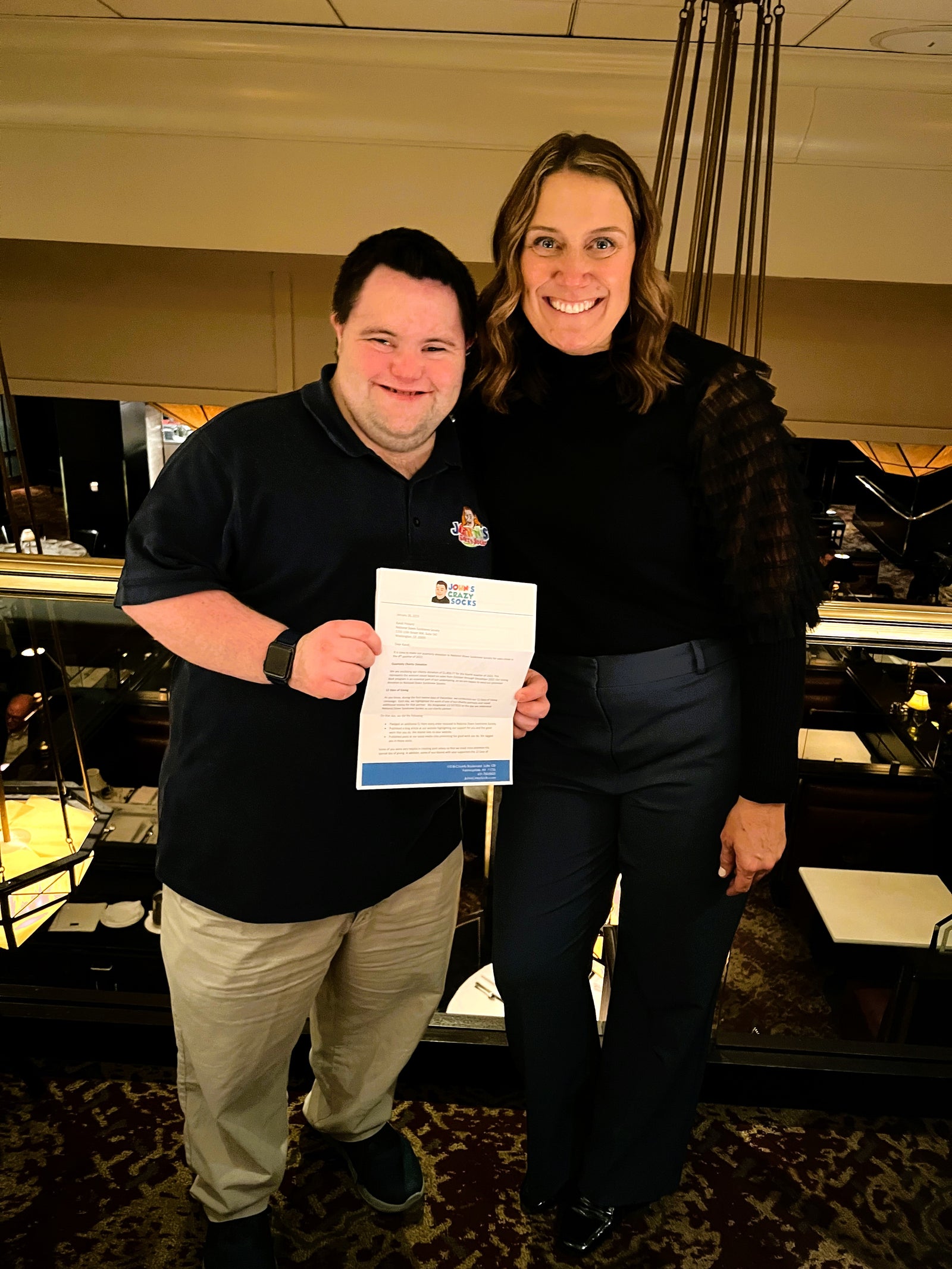 John’s Crazy Socks Delivers a Donation to the National Down Syndrome Society (NDSS)