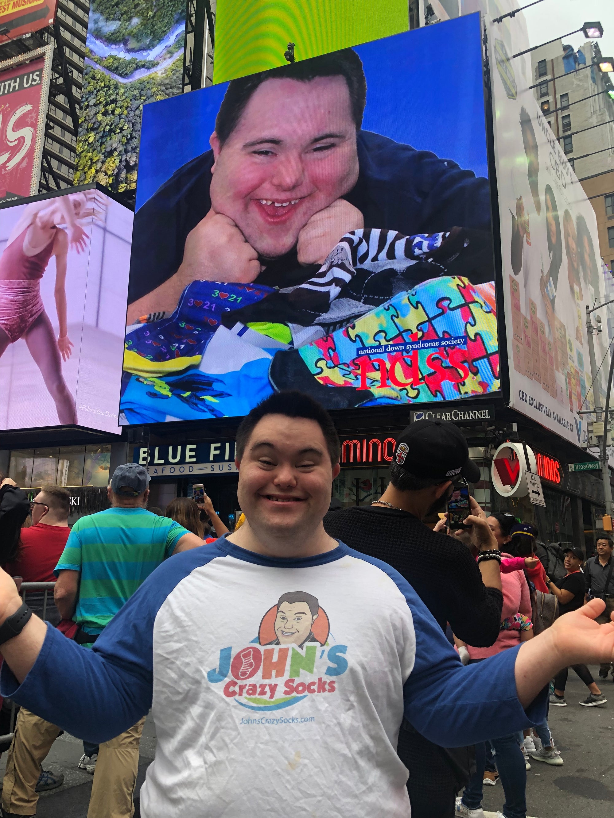 John Cronin, Co-Founder of John’s Crazy Socks, Will Be Featured in a Times Square Video
