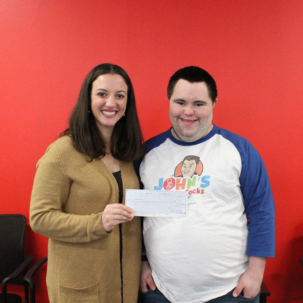 John’s Crazy Socks Presents Donation to the Special Olympics