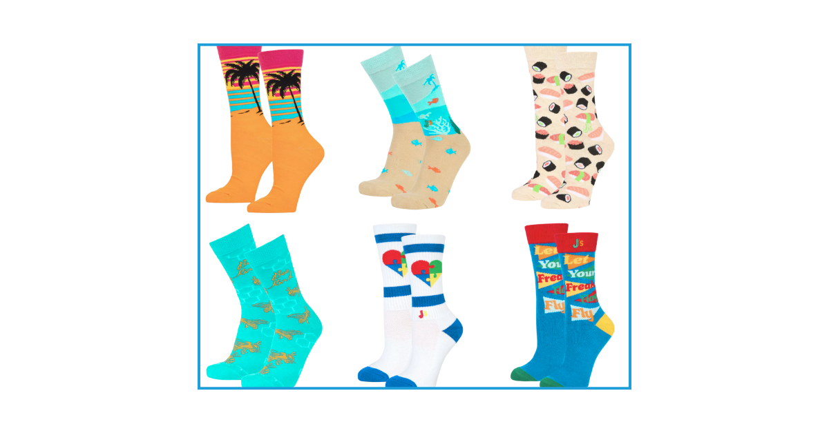 A colorful collage of six pairs of JCS novelty socks featuring designs like sunsets, ocean scenes, sushi, bees, puzzle hearts, and bold text.