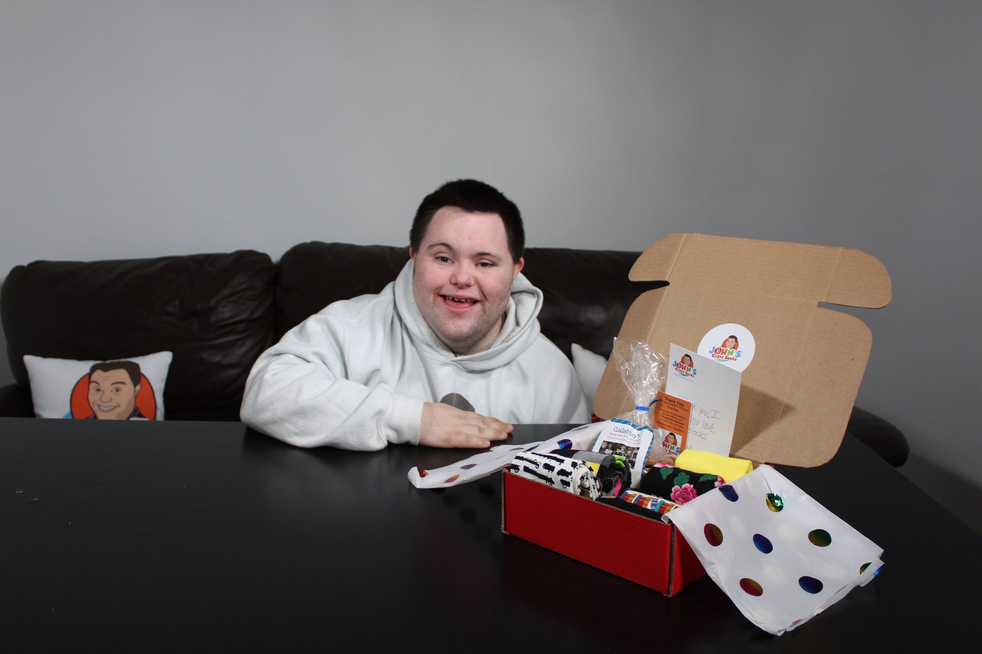 John Cronin, our Chief Happiness officer with a box of John's Crazy socks. 