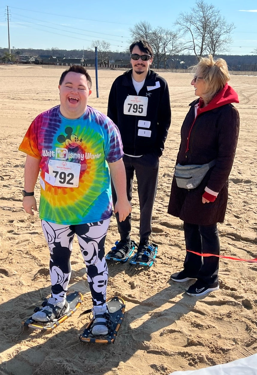 John and Andrew from John’s Crazy Socks Compete in Special Olympics Snowshoe Meet