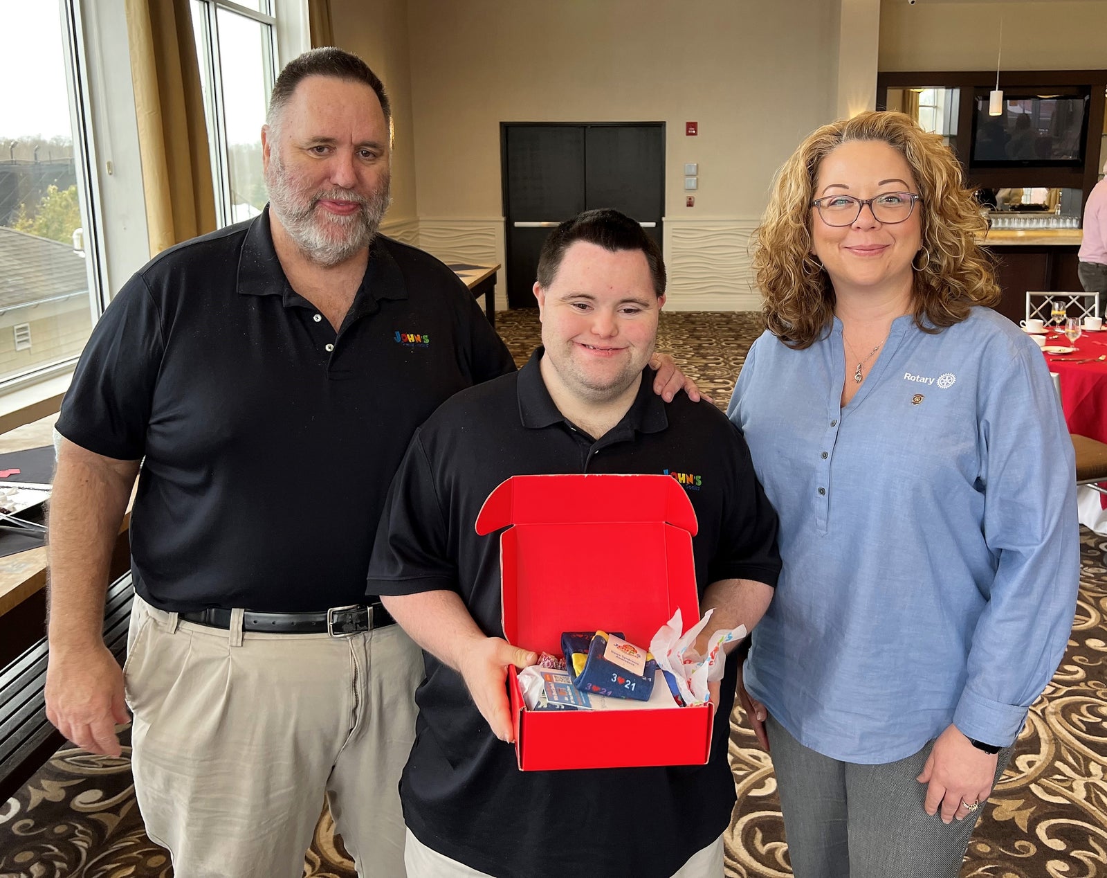 John and Mark X. Cronin of John’s Crazy Socks Speak with the Riverhead Rotary