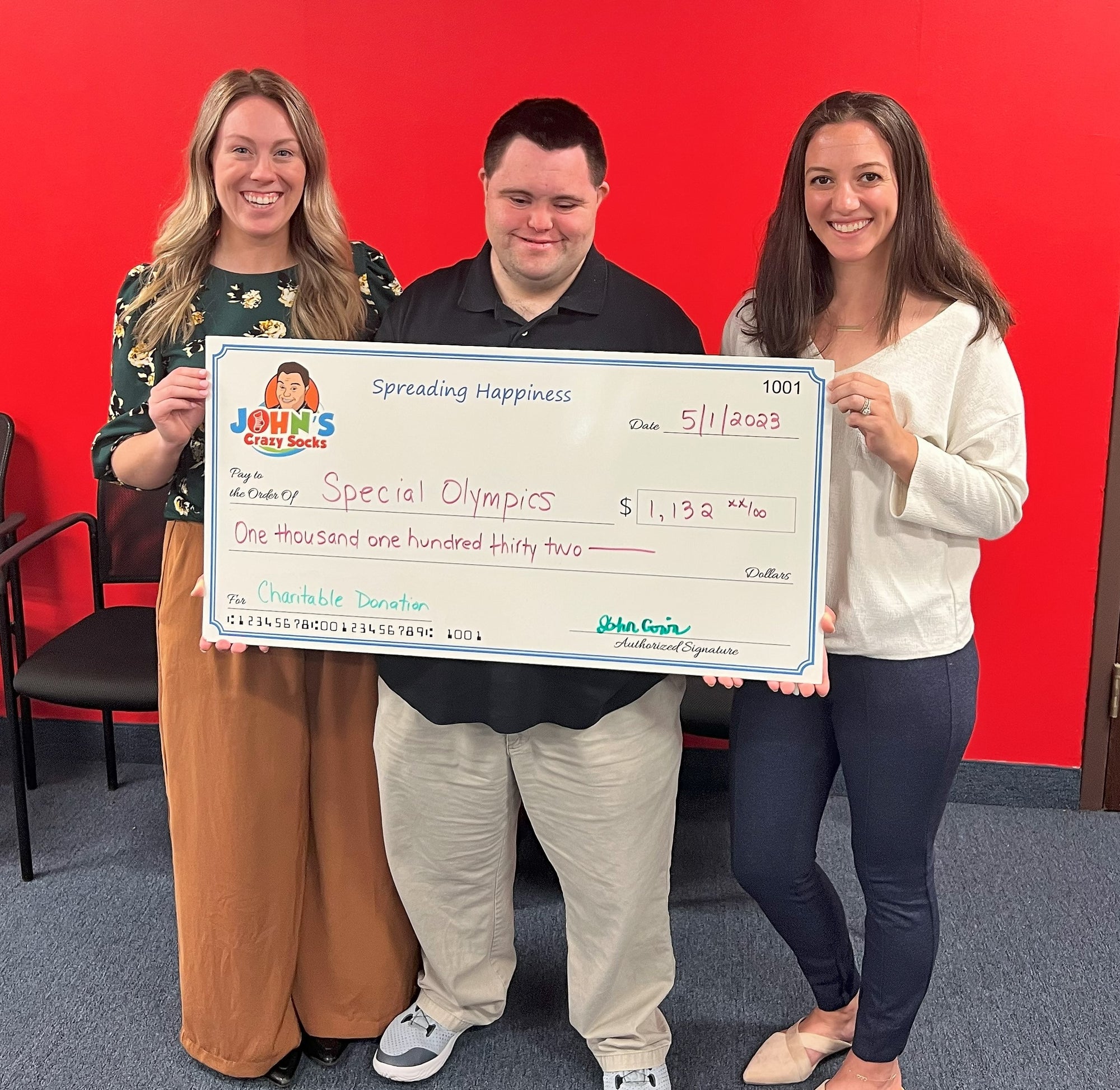 John Delivers Another Big Check to the Special Olympics