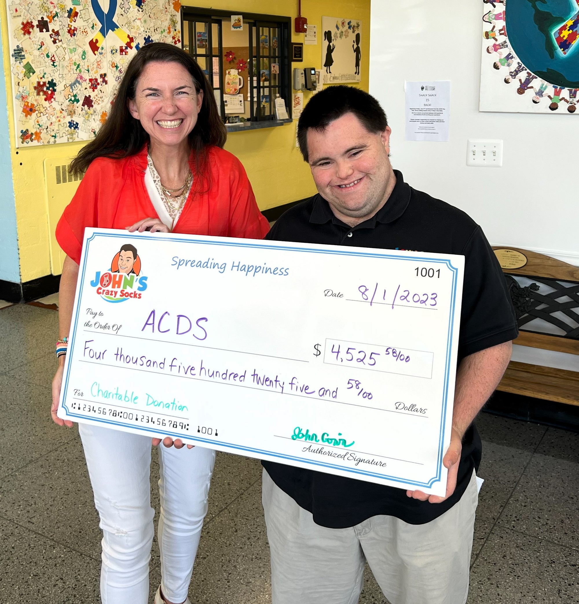 John Cronin Visits His Pre-School Alma Mater ACDS and Delivers a Donation