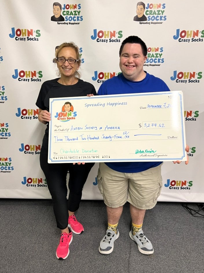 John’s Crazy Socks Delivers Donation to the Autism Society of America