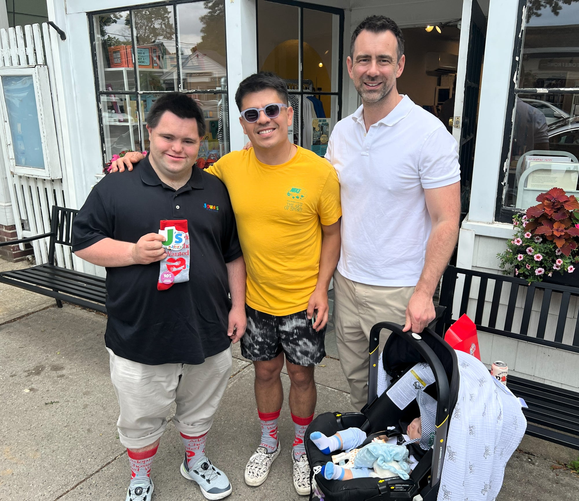 John Delivers Adoption Awareness Socks to a Family with a Newly Adopted Baby